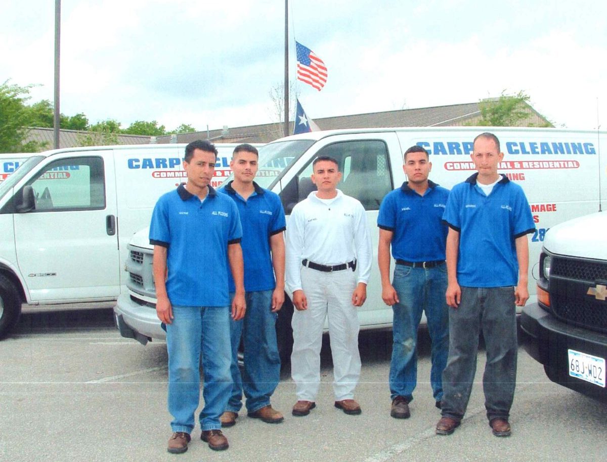 All Floors team standing in front of a company van, 2003