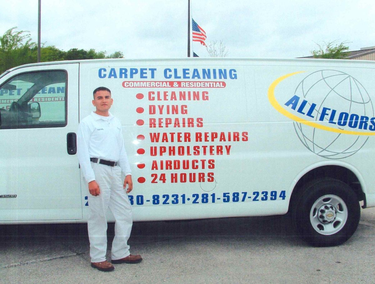Technician beside the original All Floors branded van